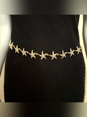 Gold tone starfish with rhinestone details chain belt